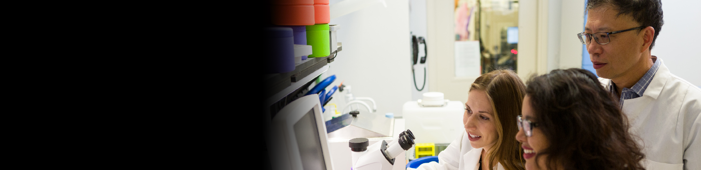 Three scientists in a lab.